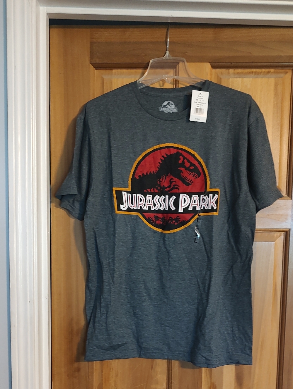 Jurassic Park Logo Tee — Charcoal Gray with Red & Yellow Logo